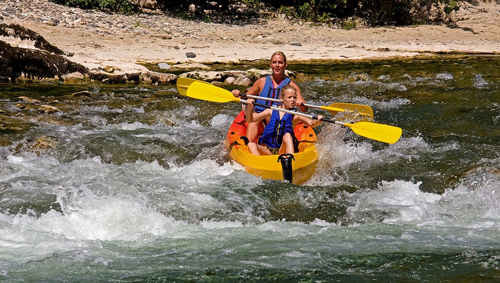 Ardeche Gorge canoe paddling parent and child