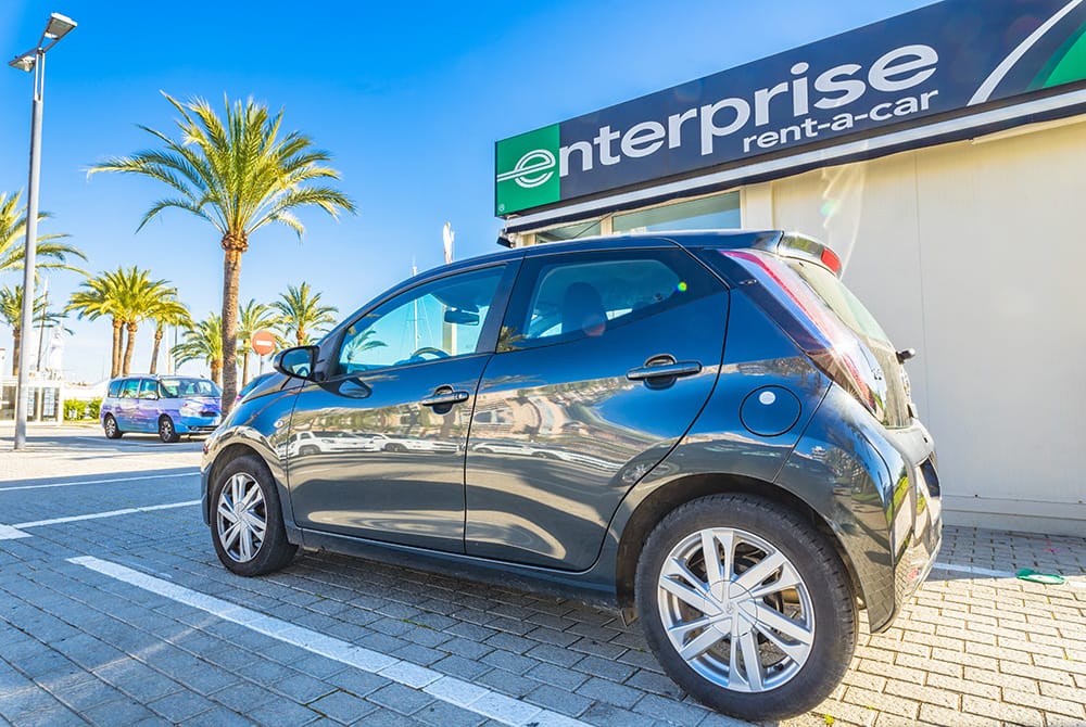 Theft from Rental Cars View of parking car in front of car rental