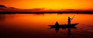 Where in the World 662 boat on lake at sunset featured image