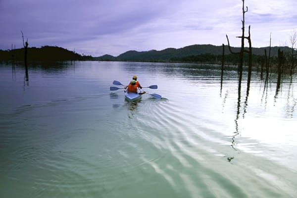 Kayaking on Lake Kenyir takes you to parts others cannot reach